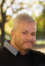 Photo of Clay Volkmann, LHIS #NC1617 from Blue Ridge Hearing - Eden