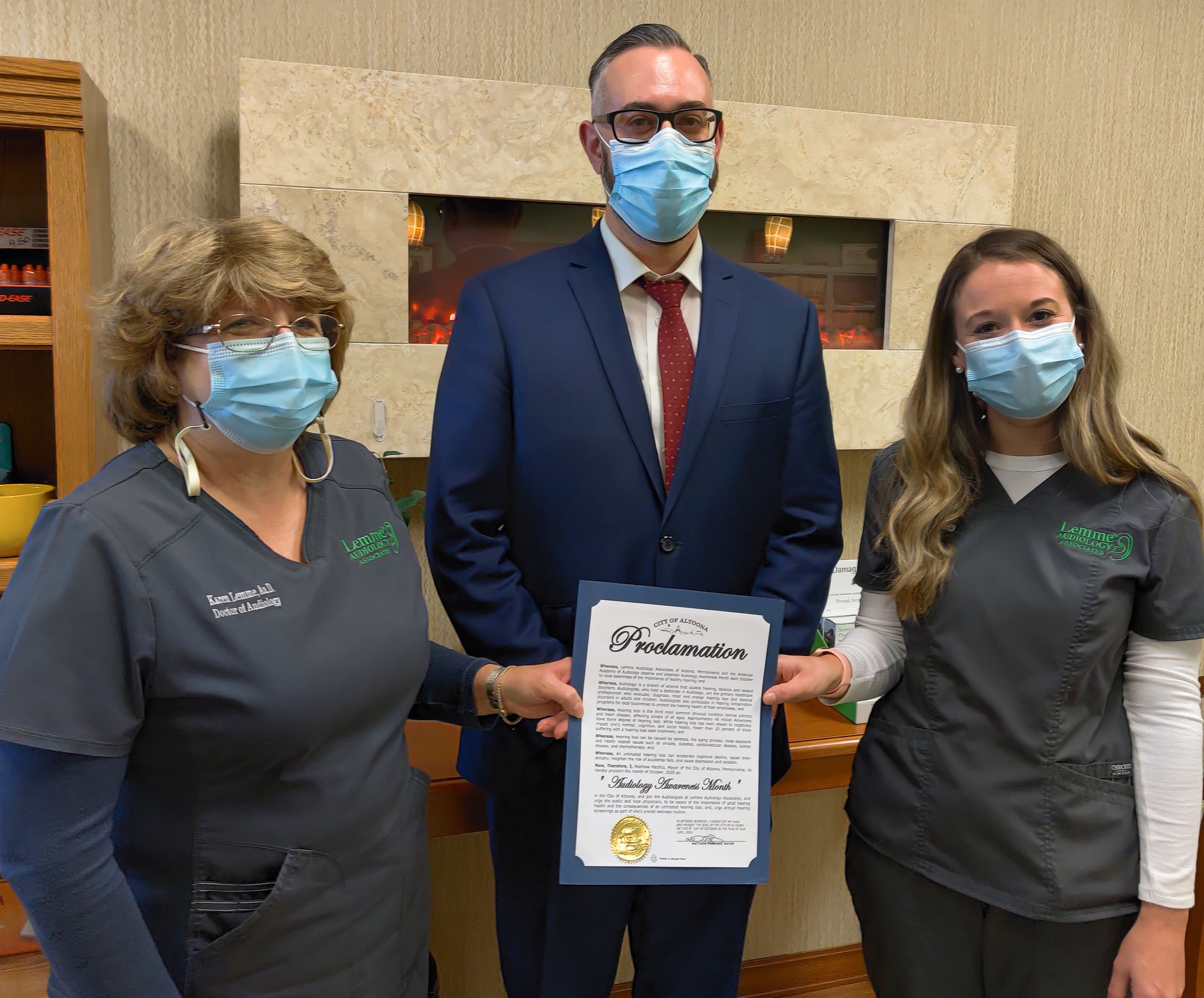 Mayor Matt Pacifico presents proclamation making October Audiology Awareness Month