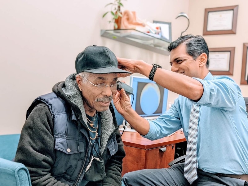 Dr. Gosu with patient