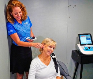 Audiologist testing patient in Melbourne FL