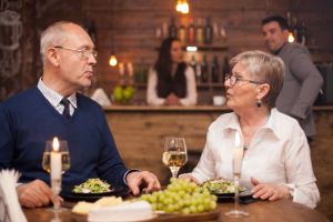 A couple dining out at a restaurant.