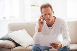 Man having serious phone conversation