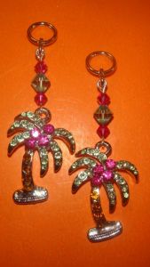 Palm tree charms for hearing aids