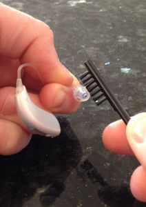 cleaning a hearing aid