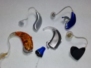 Several hearing aids of all types and colors