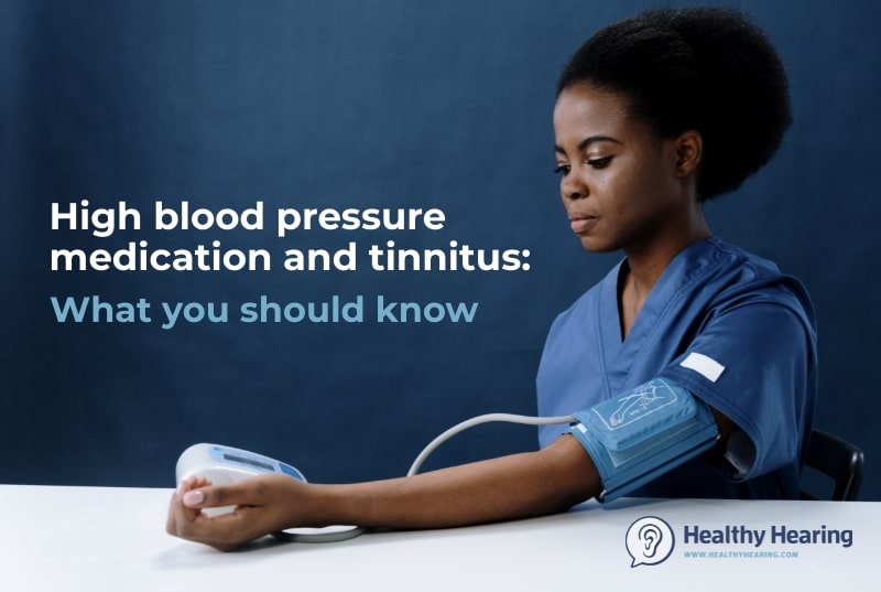 A woman checks her blood pressure. 